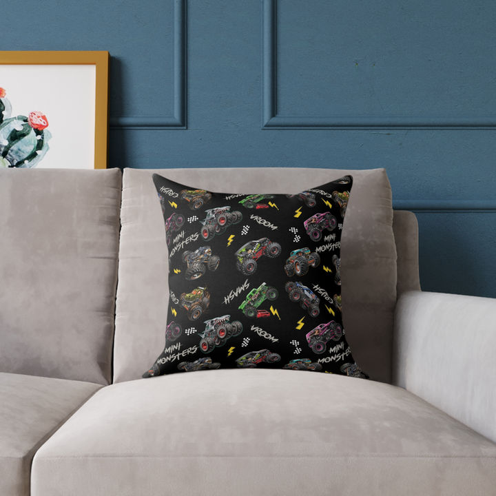 2X Monster Trucks patterned pillow on couch